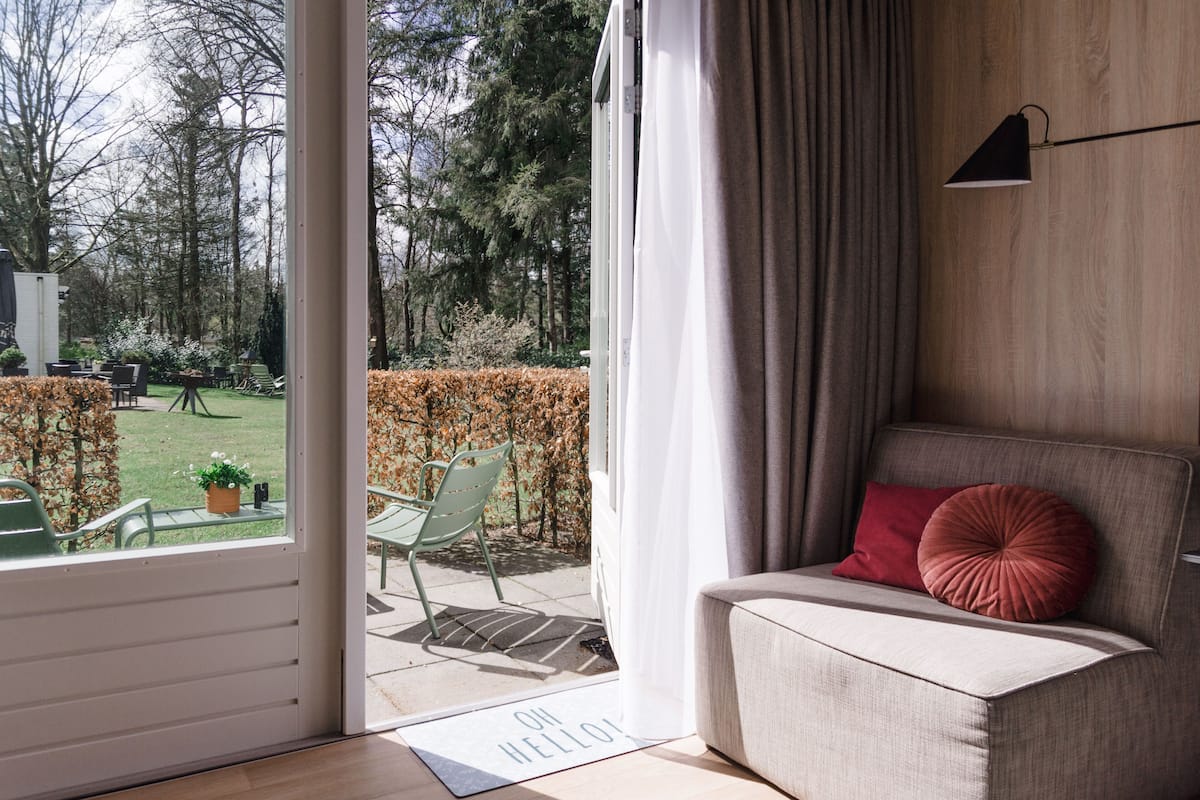 Chambre Deluxe double, terrasse | Coffre-fort, bureau, systĂšme dâinsonorisation, fer et planche Ă repasser