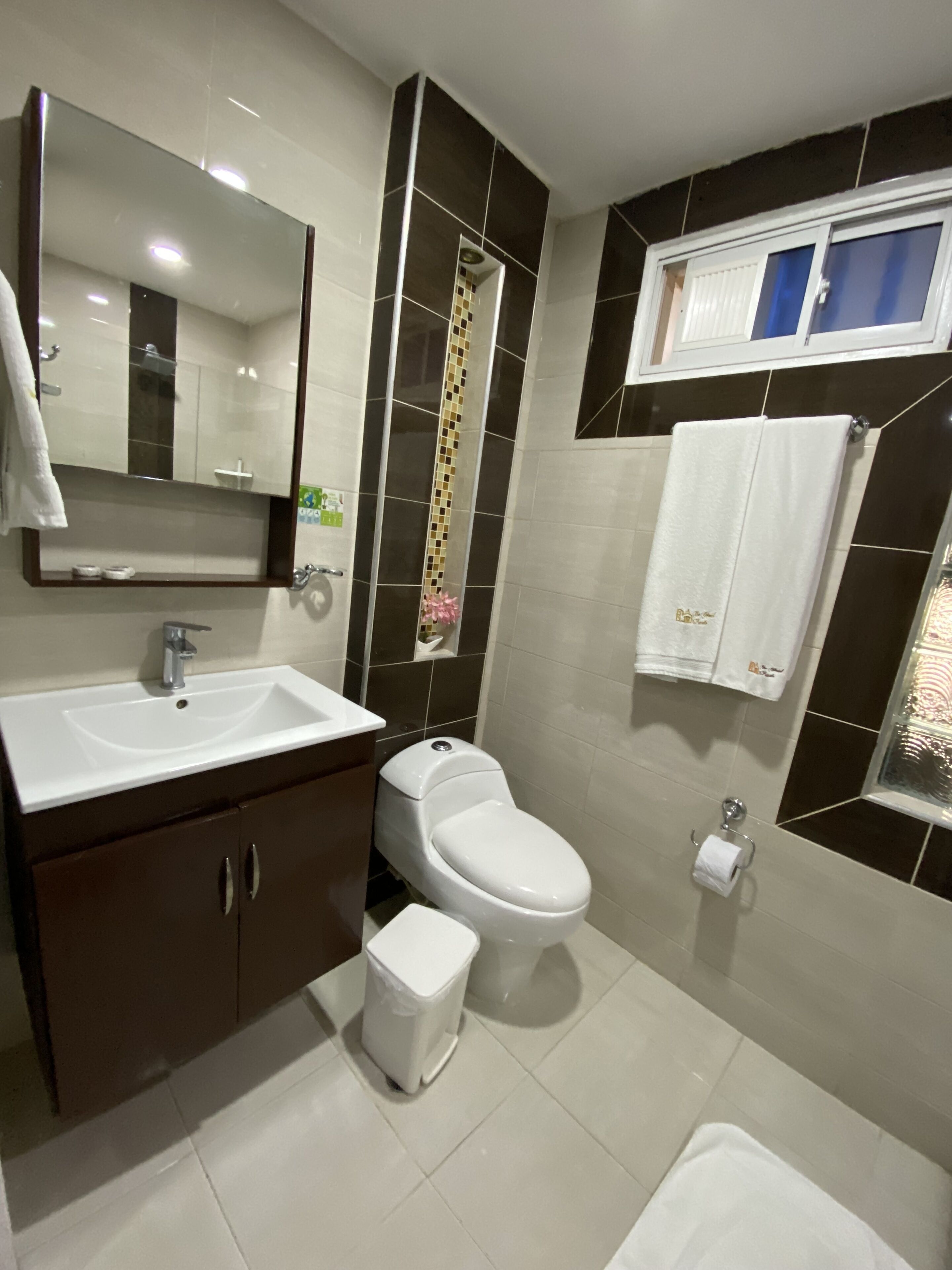 shower, free toiletries, bathrobes, towels