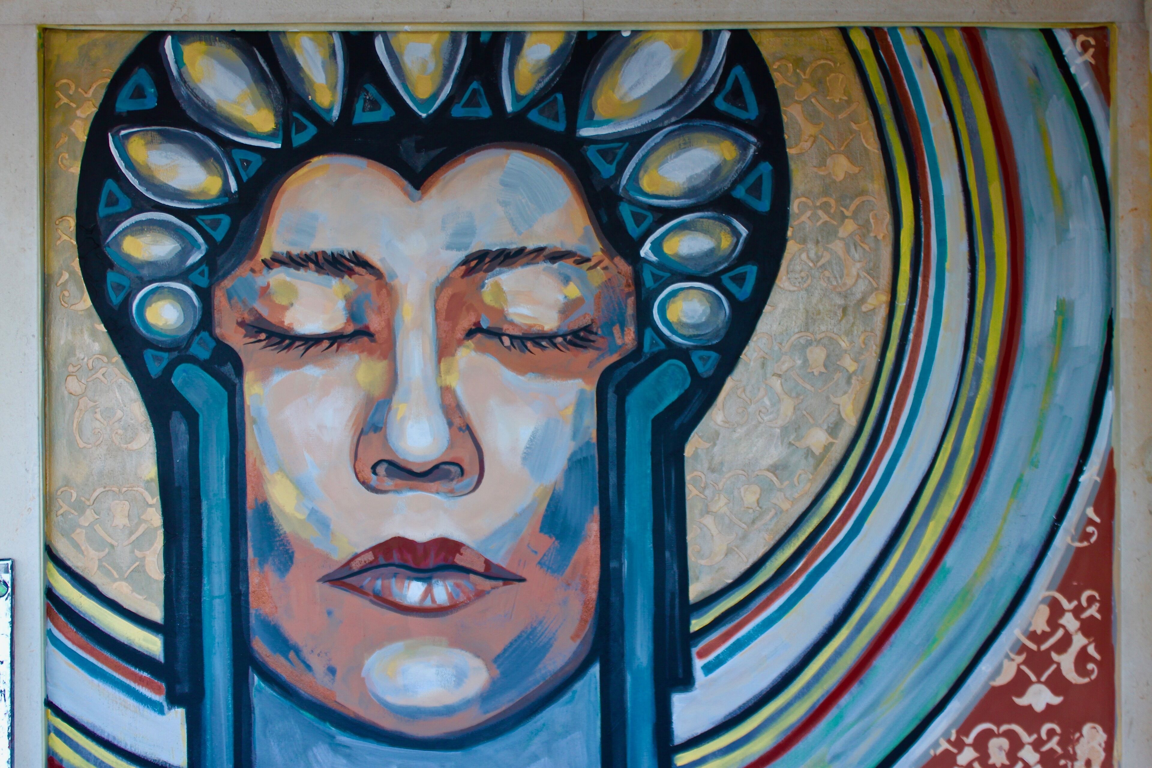 A mural with abstract patterns and shapes.
