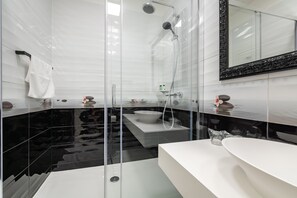 Shower, free toiletries, hair dryer, bathrobes