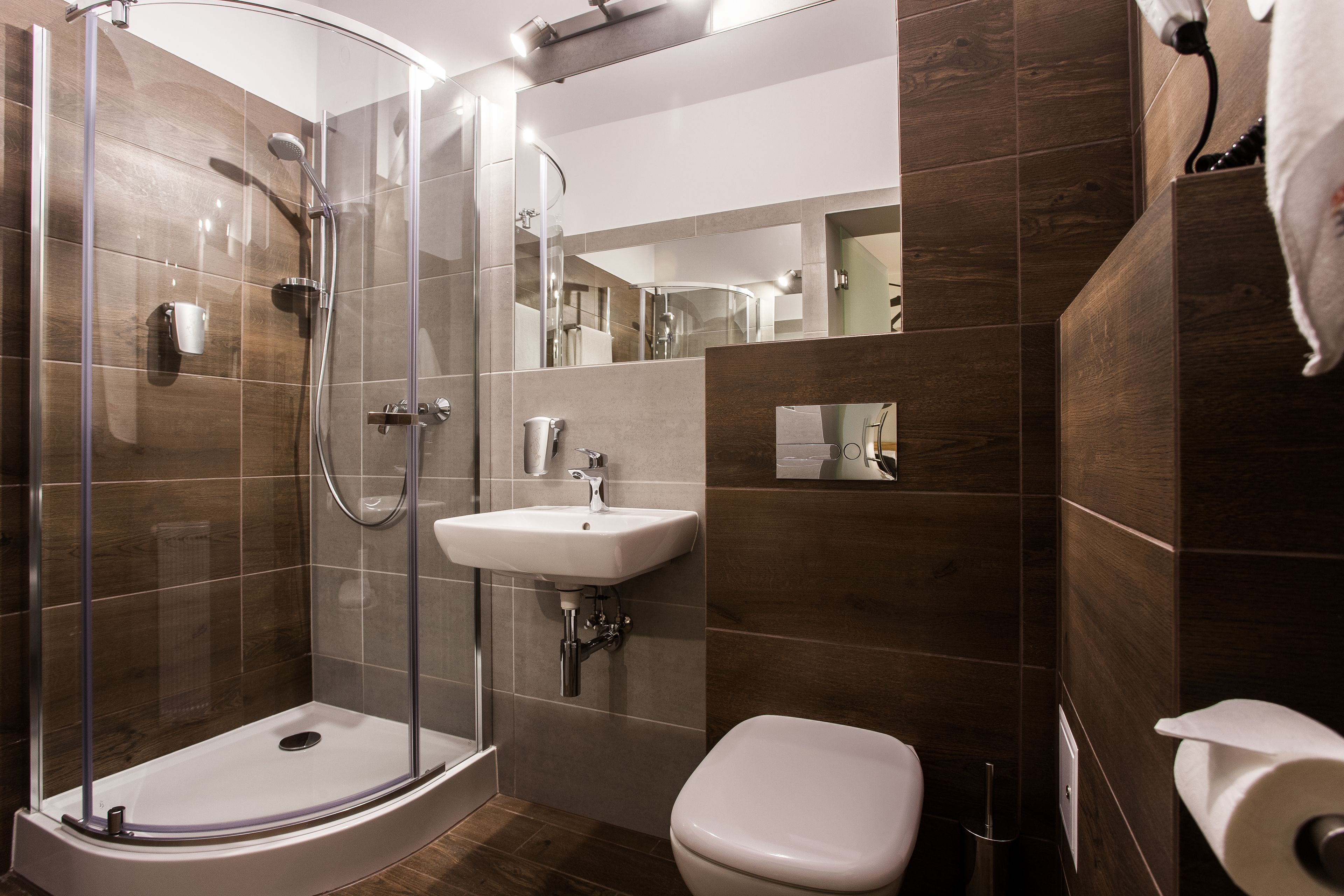 shower, designer toiletries, hair dryer, towels