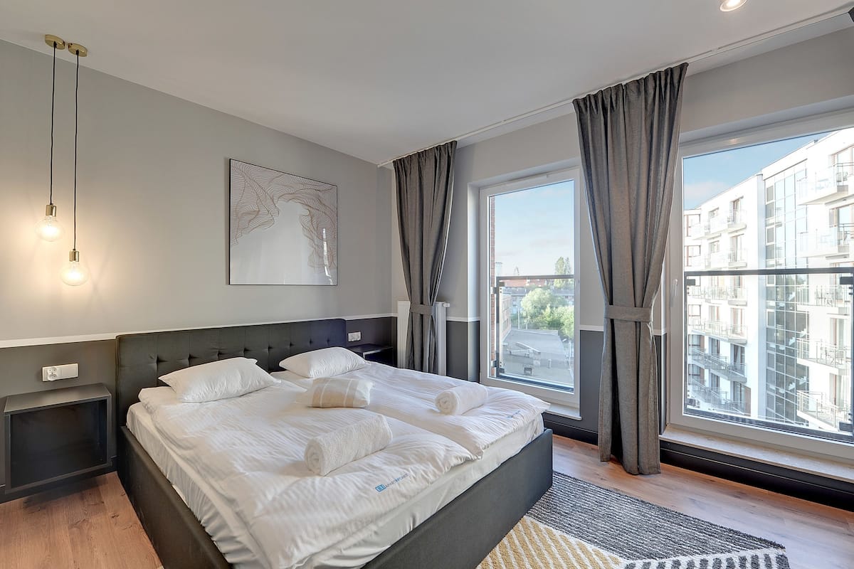 Deluxe Apartment, 1 Bedroom, Balcony ((with parking) - 113) | Iron/ironing board, cribs/infant beds, free WiFi, bed sheets