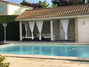 Outdoor pool, open 10:00 AM to 8:30 PM, pool loungers