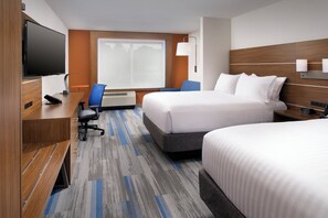 A hotel room with two beds, a desk with a chair, a television, and a window with curtains. - Holiday Inn Express & Suites Altoona by IHG (Altoona)