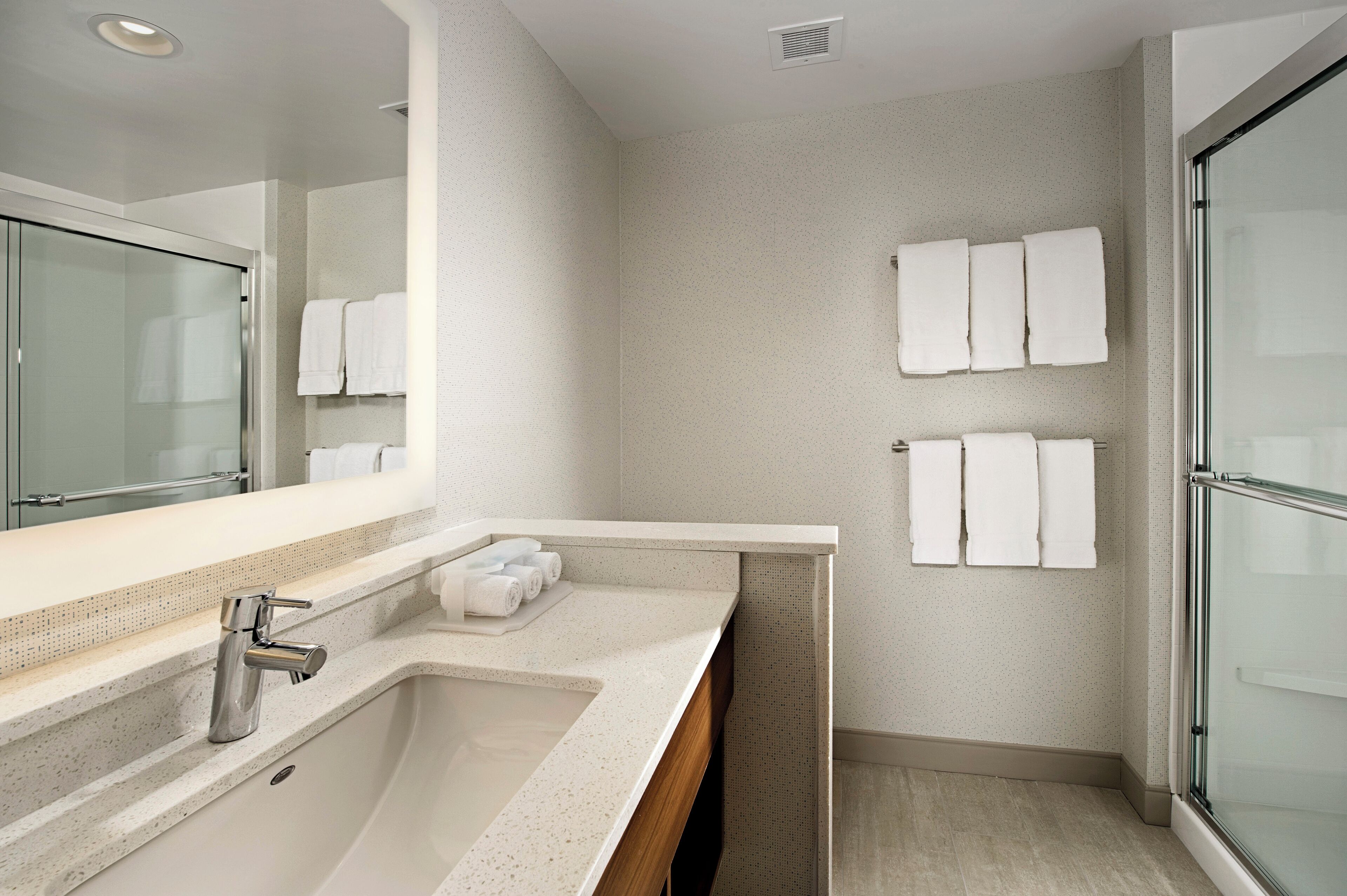 separate bathtub and shower, free toiletries, hair dryer, towels