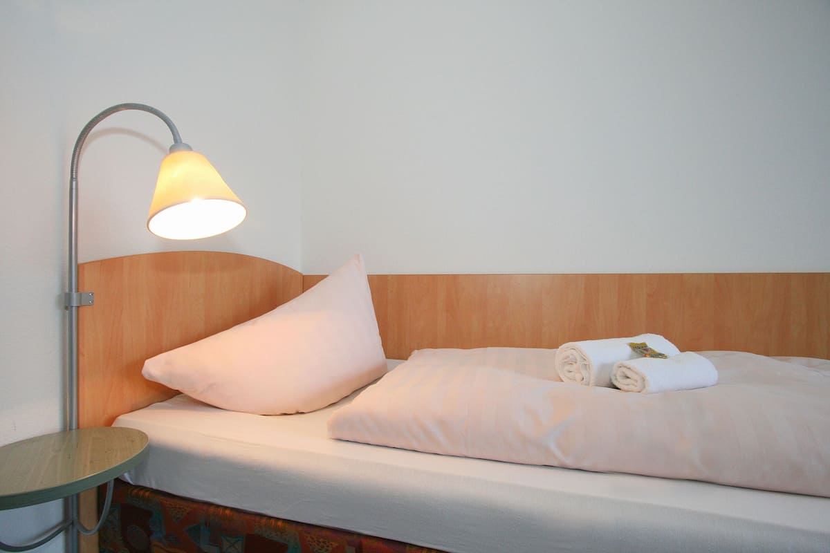 economy single room | 1 bedroom, minibar, individually decorated, individually furnished