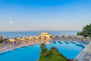 Indoor pool, outdoor pool, pool umbrellas, sun loungers