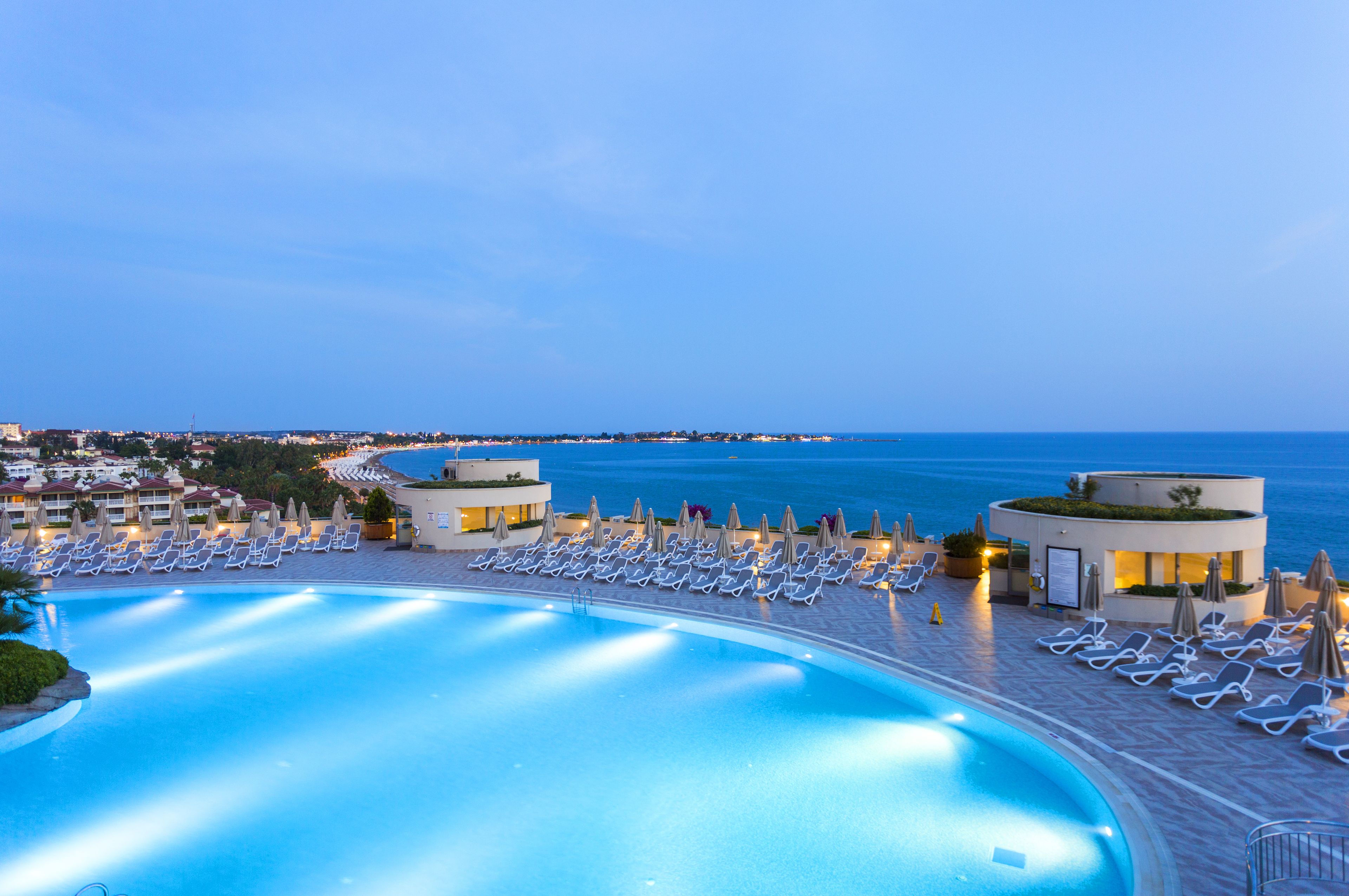 indoor pool, outdoor pool, pool umbrellas, pool loungers