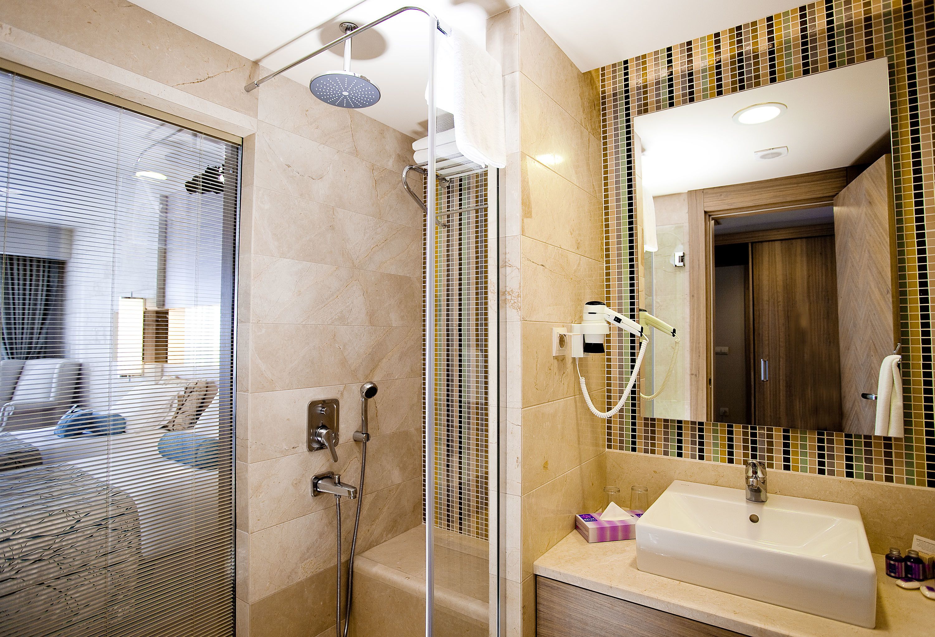 shower, free toiletries, hair dryer, towels