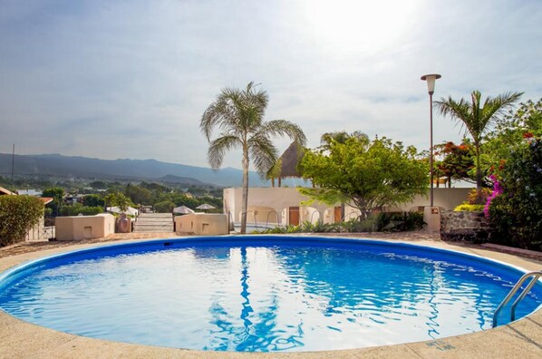2 outdoor pools, open 8:00 AM to 8:00 PM, free pool cabanas