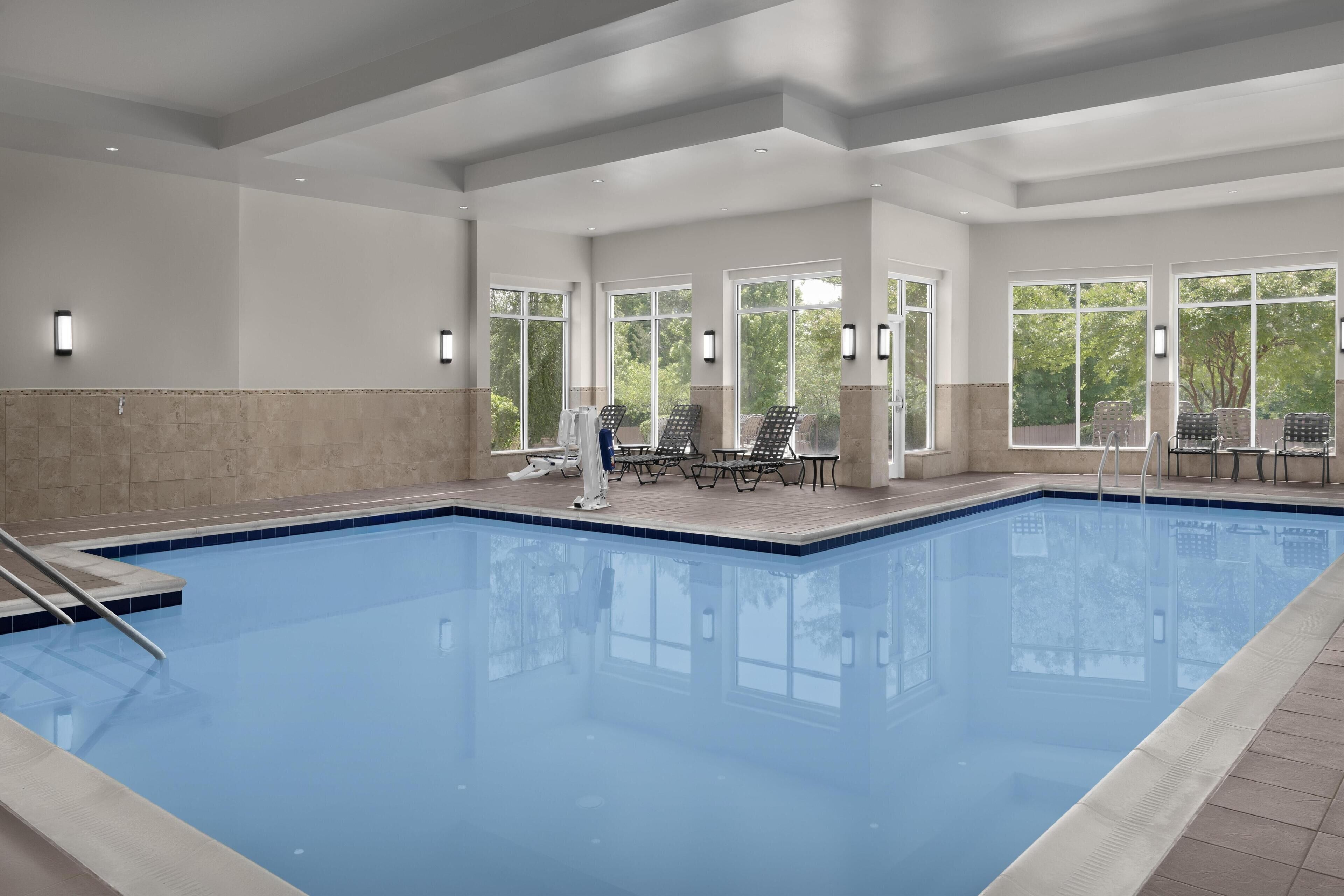 Indoor pool, open 7:00 AM to 10:00 PM, sun loungers