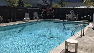 Outdoor pool, pool umbrellas, pool loungers