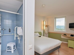 Room, 1 Double Bed, Accessible | Bathroom | Shower, eco-friendly toiletries, hair dryer, towels - ibis budget Bern Expo (Bern)