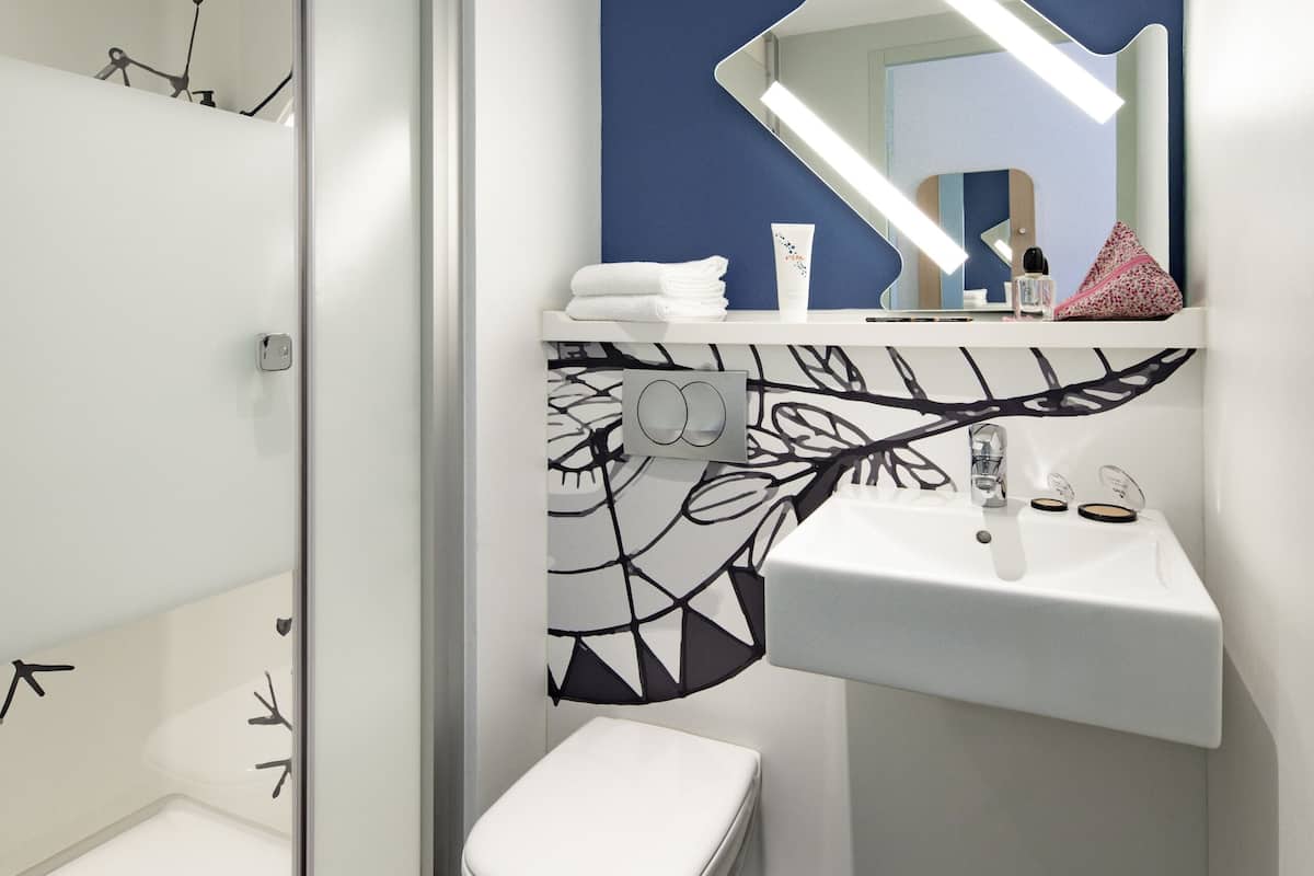 shower, eco-friendly toiletries, hair dryer, towels