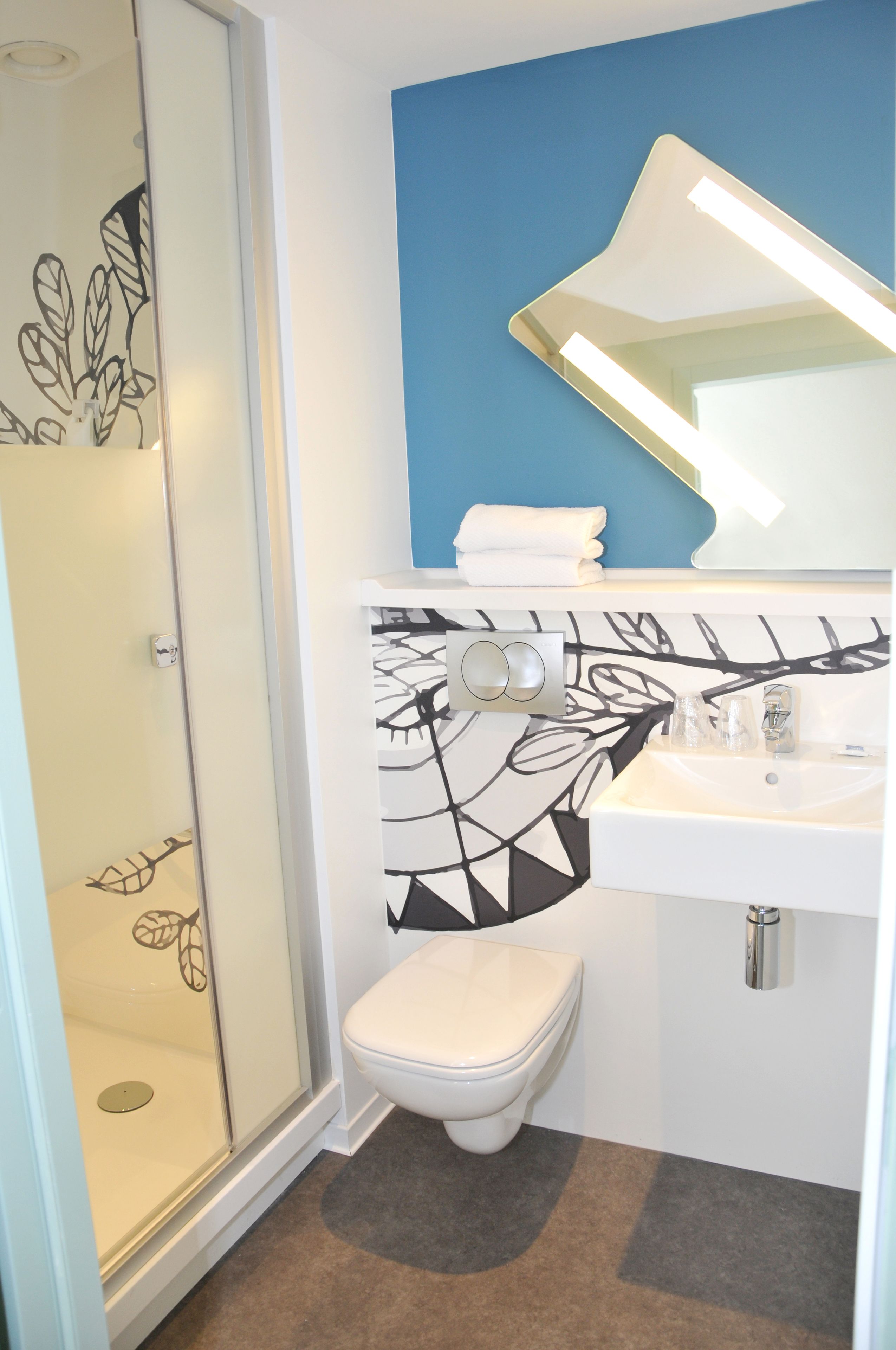 shower, eco-friendly toiletries, hair dryer, towels