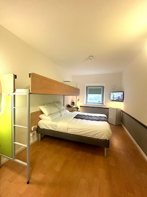 Blackout curtains, iron/ironing board, free WiFi, bed sheets