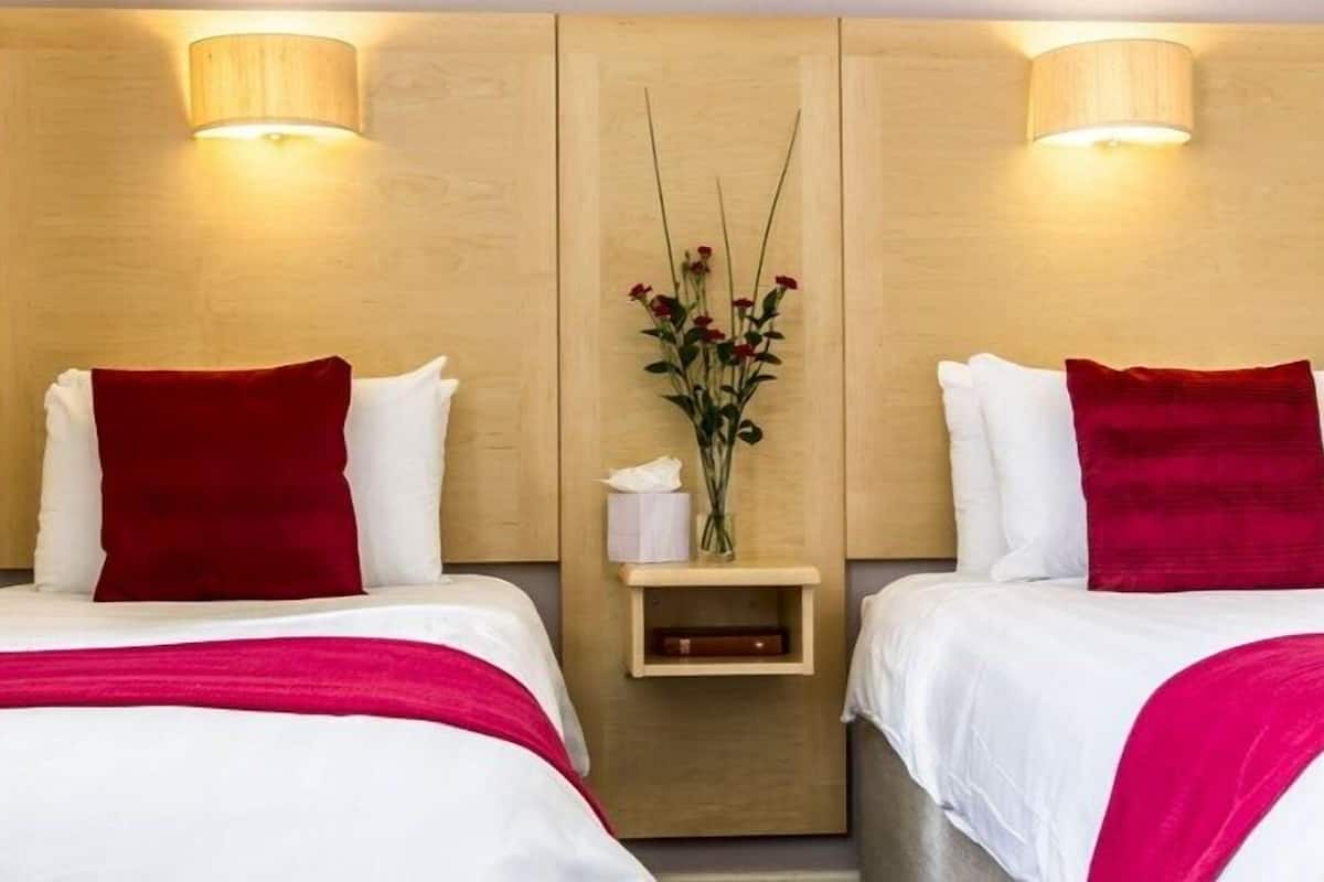 twin room | 1 bedroom, blackout curtains, iron/ironing board, free wifi