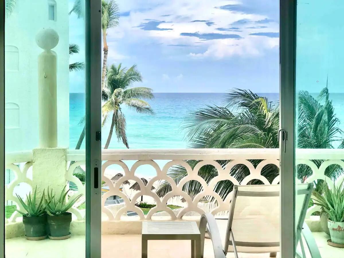 Departamento familiar, varias camas, vista a la playa | Terraza o patio