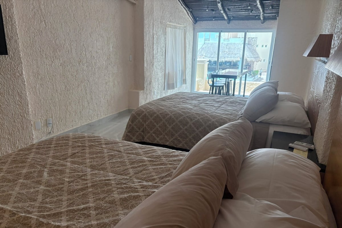 Suite Studio Premium, vue plage, en bord de plage | Literie de qualité supérieure, couette en duvet d'oie