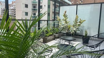 Departamento Deluxe, 1 cama matrimonial y sofá cama | Terraza o patio