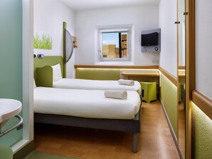 Desk, free WiFi, bed sheets