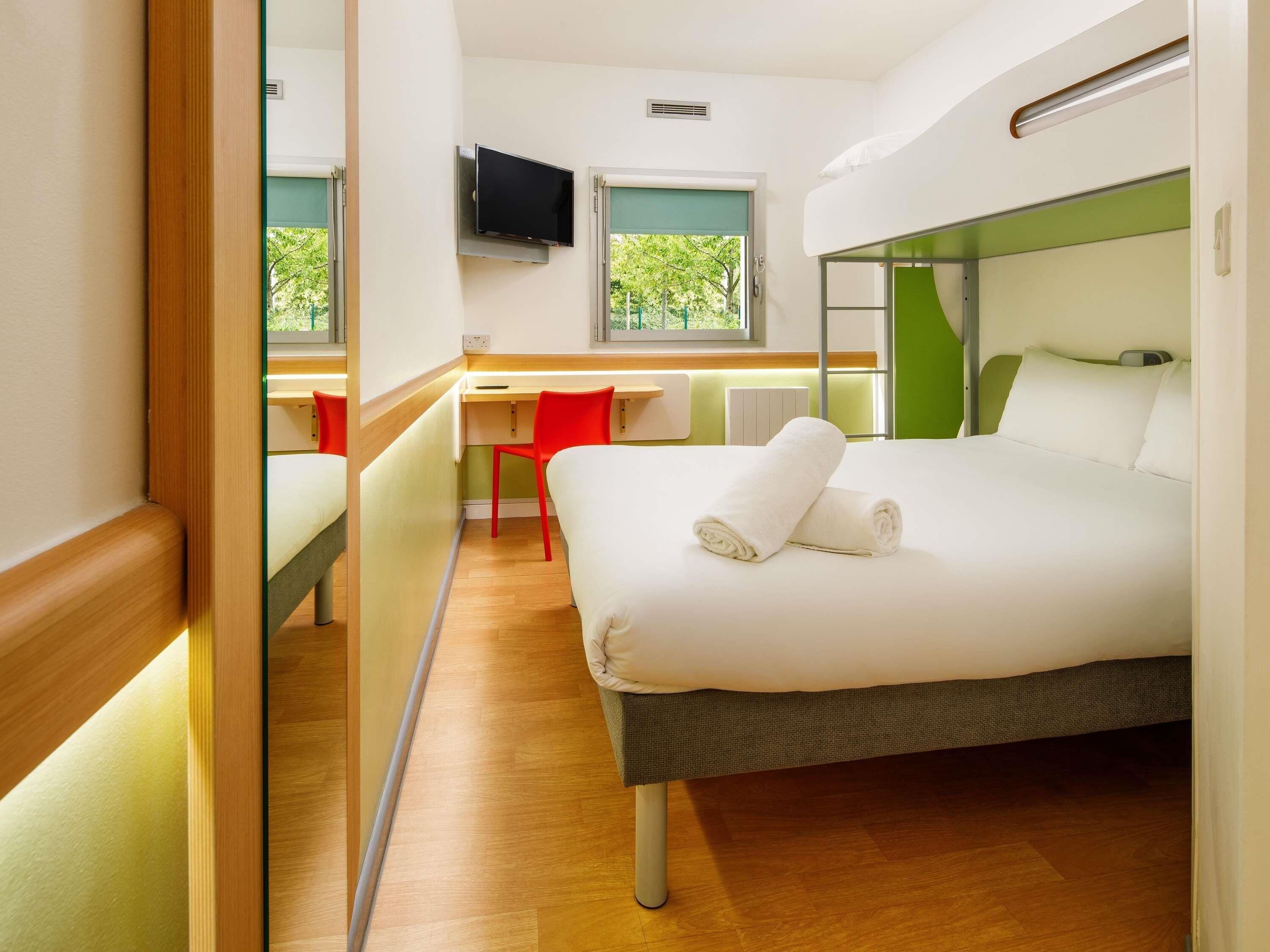 Triple Room, Multiple Beds | Desk, free cots/infant beds, free WiFi, bed sheets