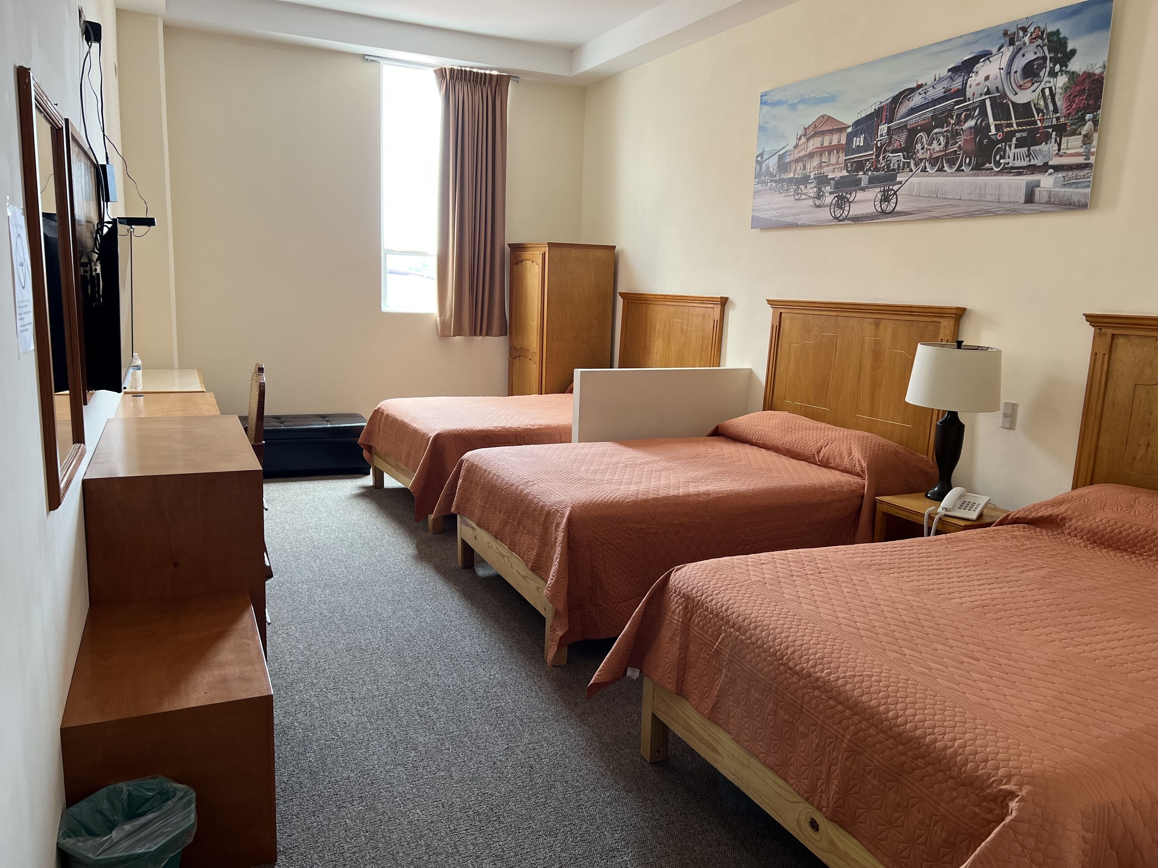 Family Room | Desk, laptop workspace, blackout drapes, soundproofing