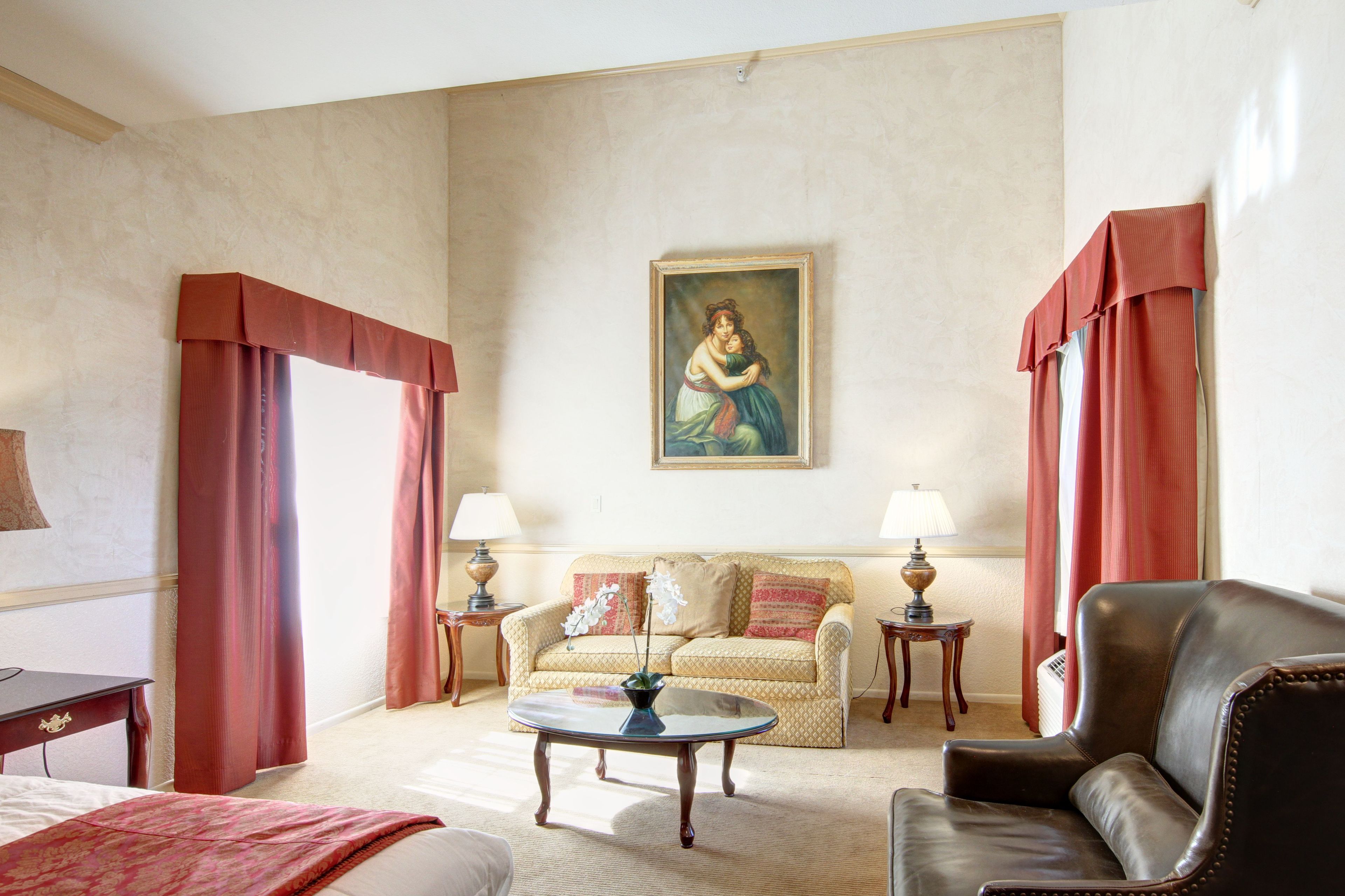 desk, laptop workspace, blackout curtains, iron/ironing board