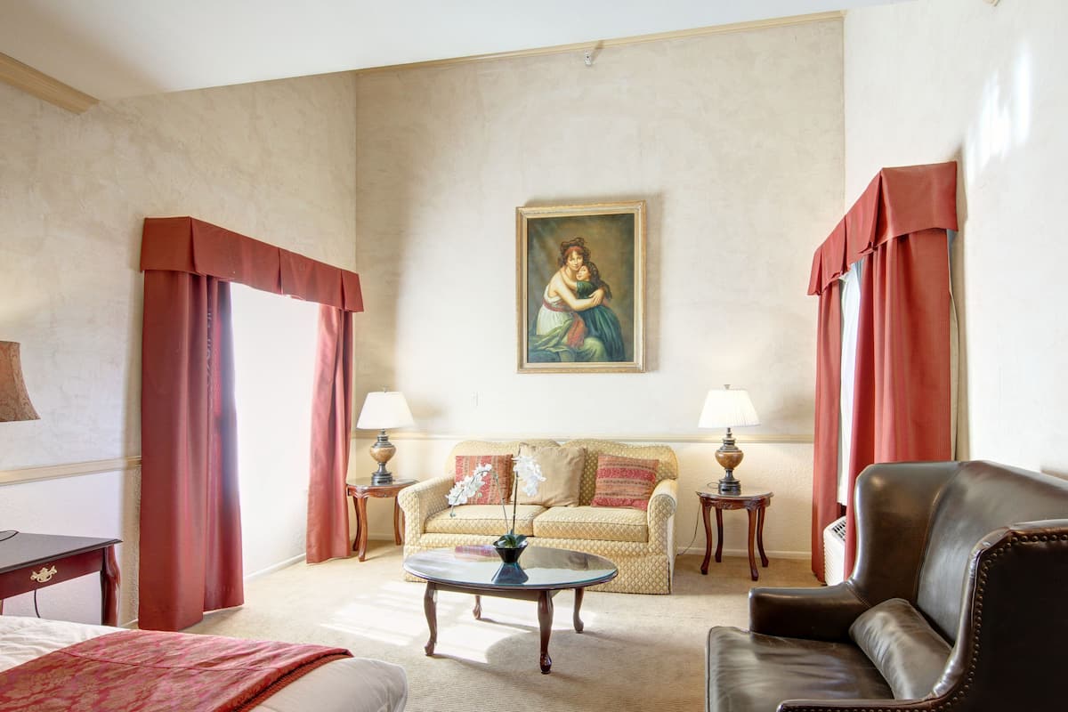 desk, laptop workspace, blackout curtains, iron/ironing board