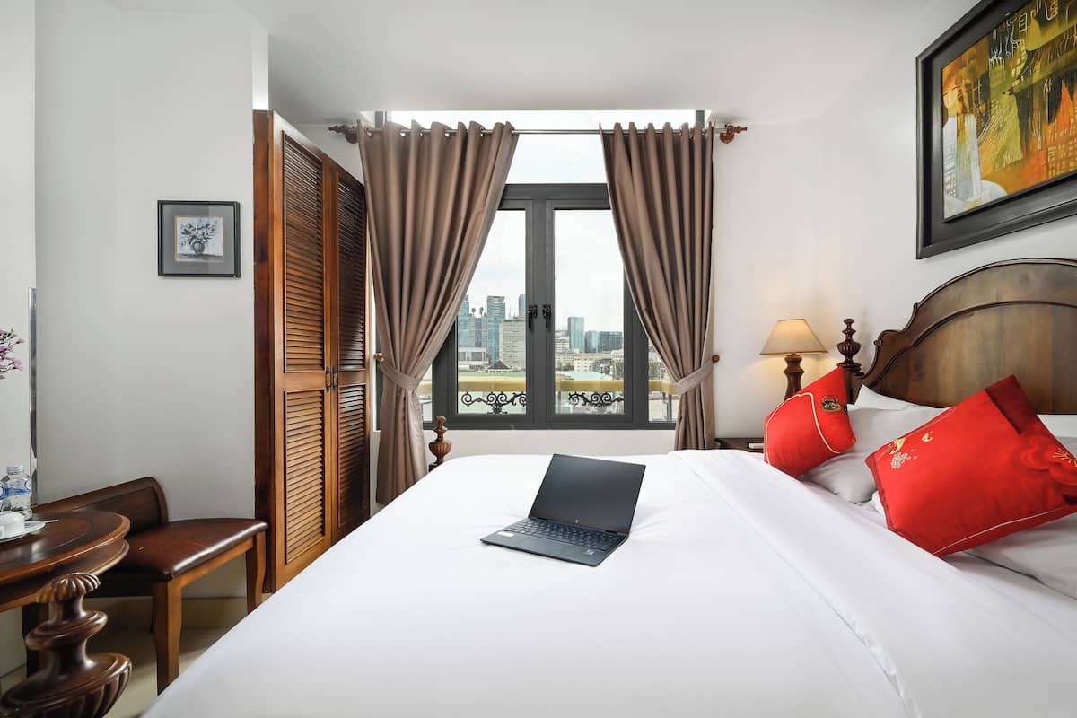 Deluxe Double Room, City View | Minibar, in-room safe, desk, laptop workspace