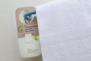 Shower, hydromassage showerhead, eco-friendly toiletries, towels
