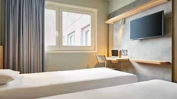Chambre avec lits jumeaux, 2 lits une place | Bureau, chambres insonorisées, Wi-Fi gratuit, draps fournis