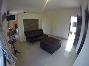 Suite | Living room | 32-inch flat-screen TV with cable channels, TV