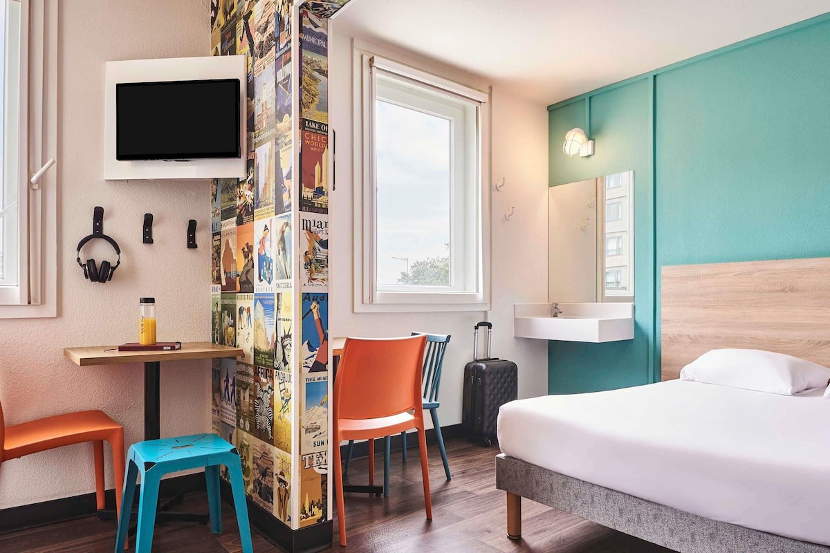 Family Room, Multiple Beds, Shared Bathroom | Blackout curtains, iron/ironing board, free WiFi, bed sheets