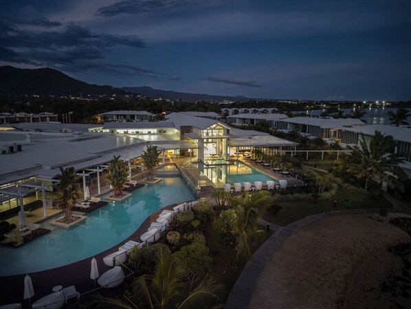 2 outdoor pools, open 6:00 AM to 9:00 PM, pool umbrellas, pool loungers