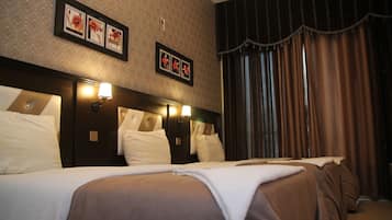 Habitación triple estándar, 3 camas individuales | Minibar y caja de seguridad en la habitación