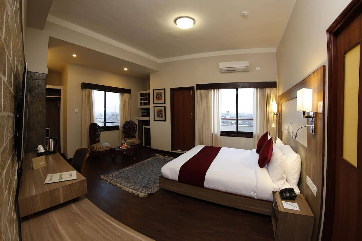 2 habitaciones, ropa de cama de alta calidad y minibar