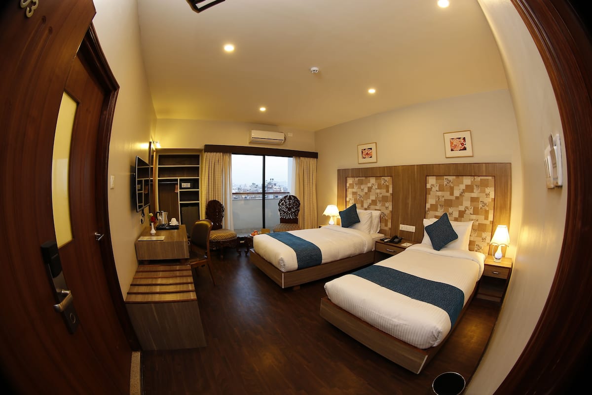 2 habitaciones, ropa de cama de alta calidad y minibar