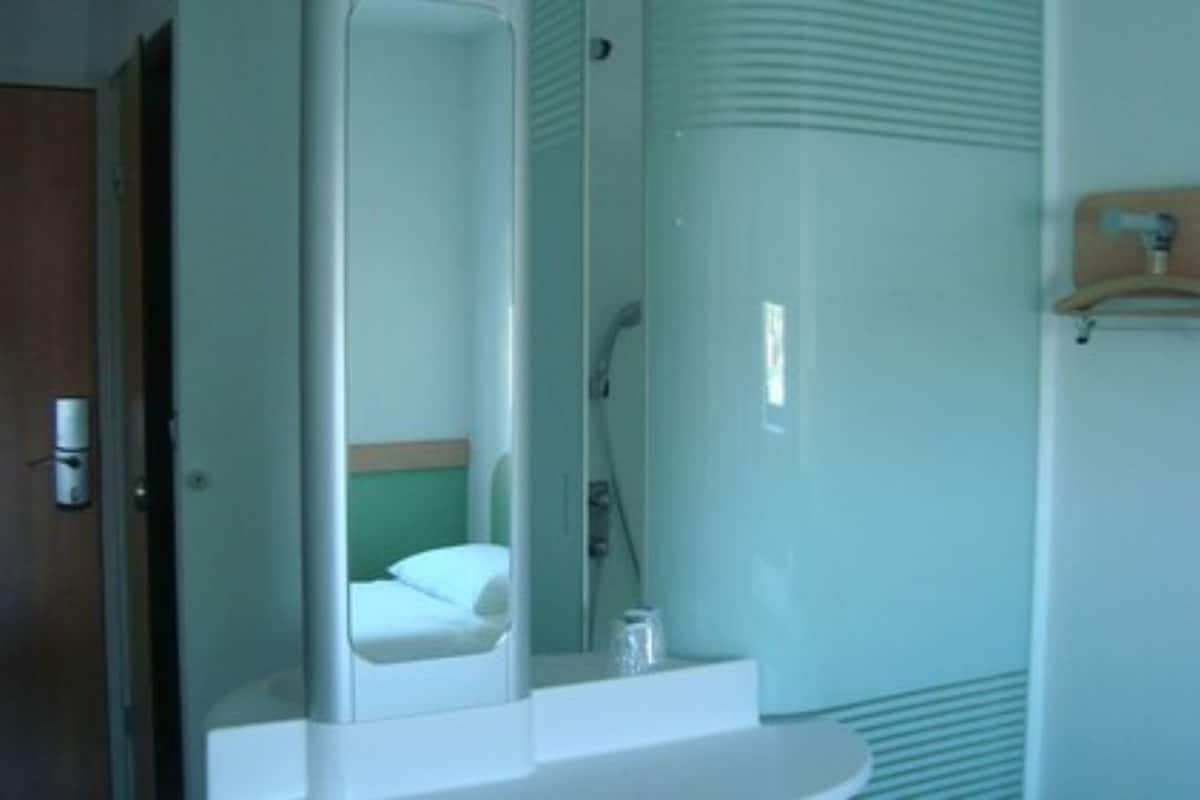 shower, eco-friendly toiletries, hair dryer, towels