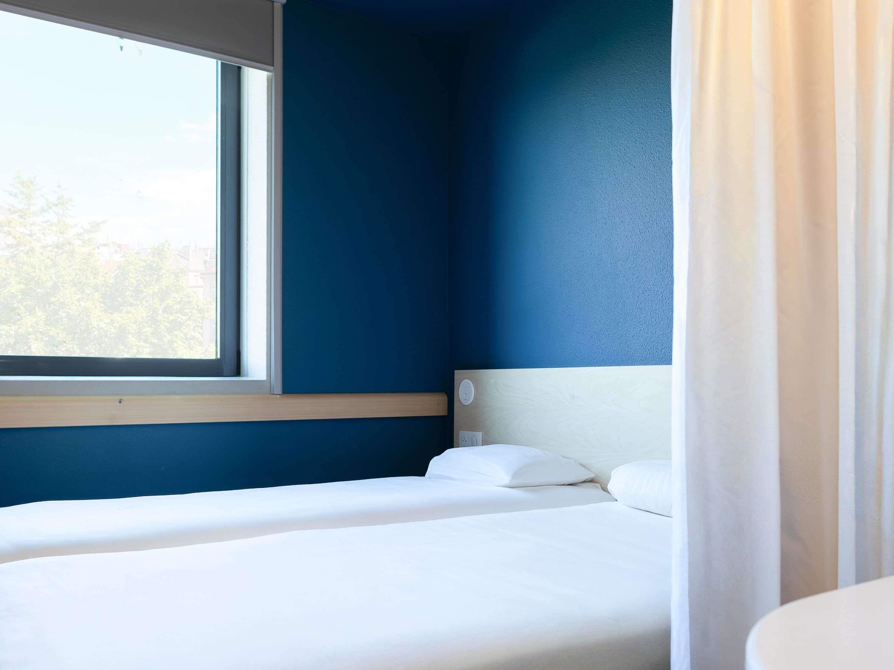 Premium bedding, desk, blackout curtains, soundproofing