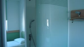 Shower, eco-friendly toiletries, hair dryer, towels
