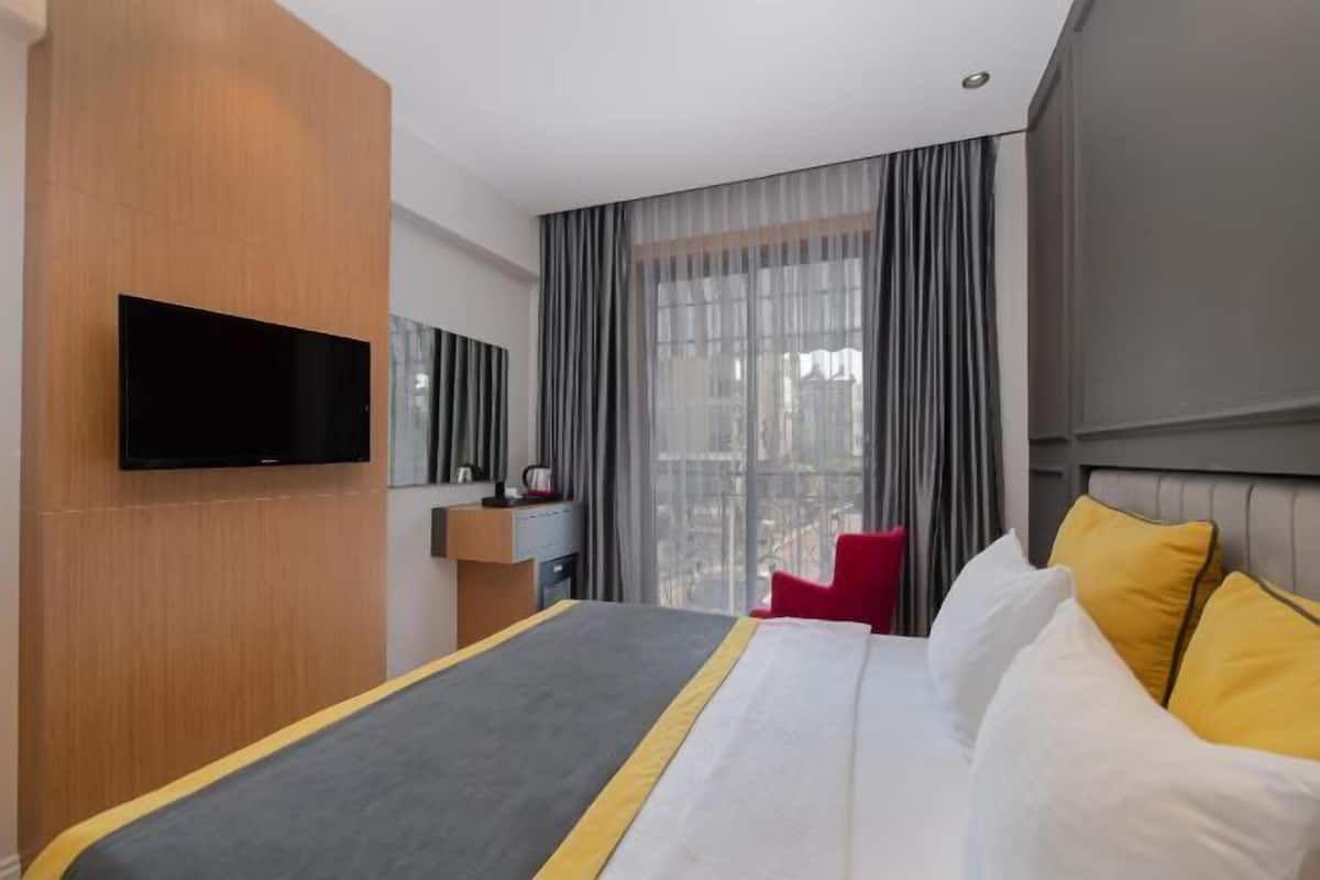 Ropa de cama de alta calidad y minibar