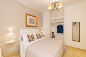 Premium bedding, desk, laptop workspace, soundproofing