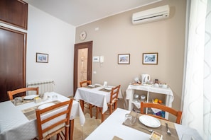 Electric kettle, cleaning supplies, dining tables