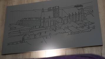 A detailed architectural drawing of a cityscape with various buildings and structures.