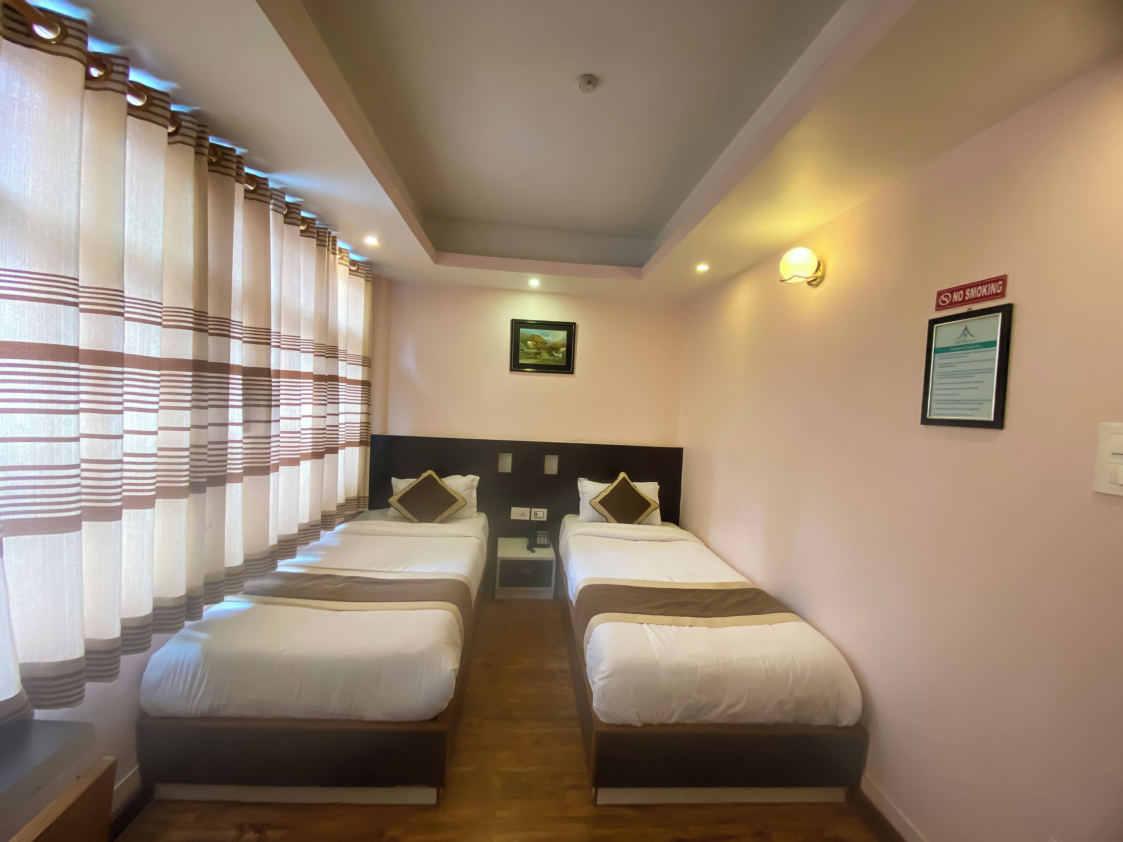 deluxe twin room, 2 single beds | in-room safe, desk, laptop workspace, free wifi