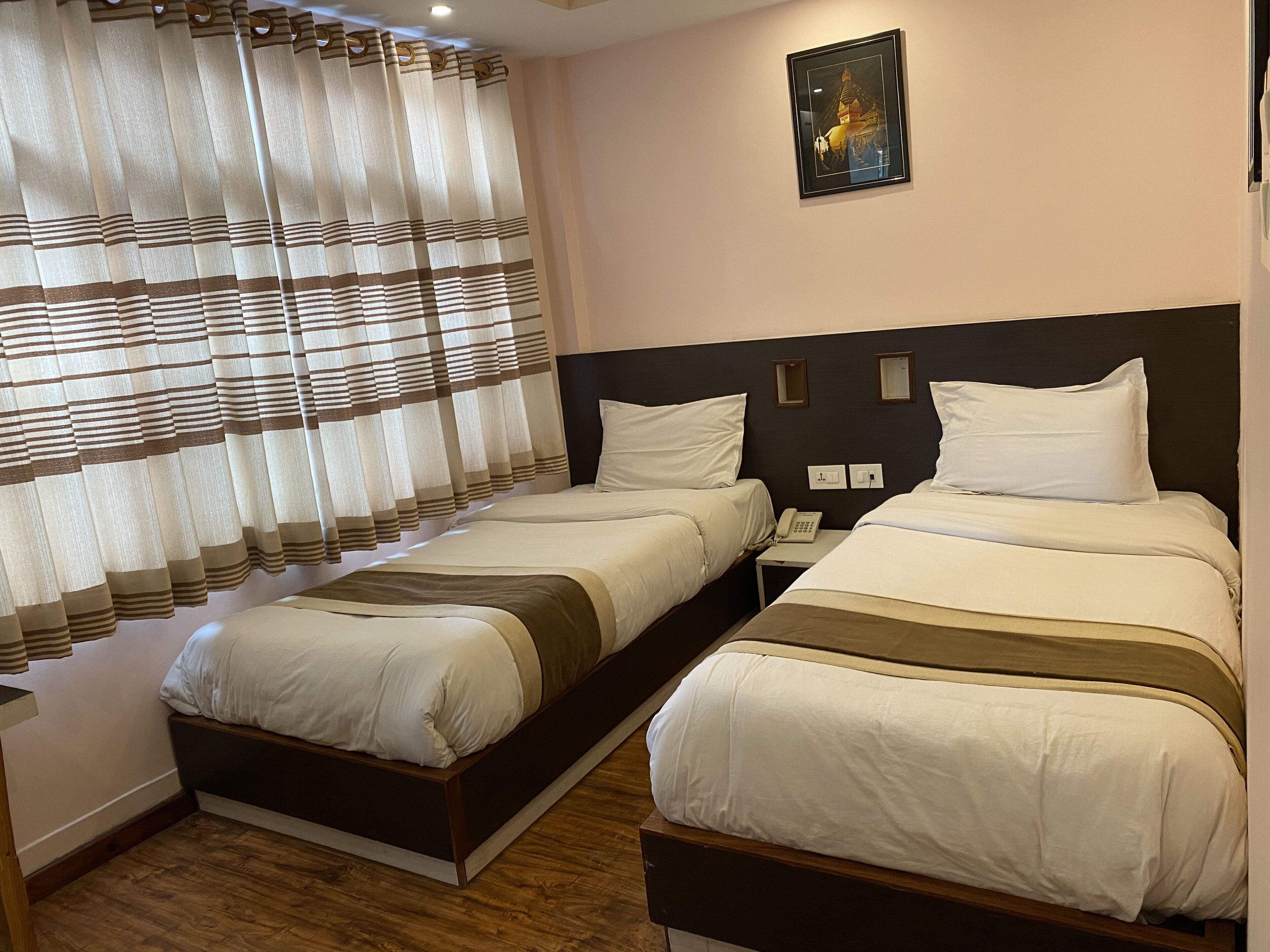 deluxe twin room, 2 single beds | in-room safe, desk, laptop workspace, free wifi