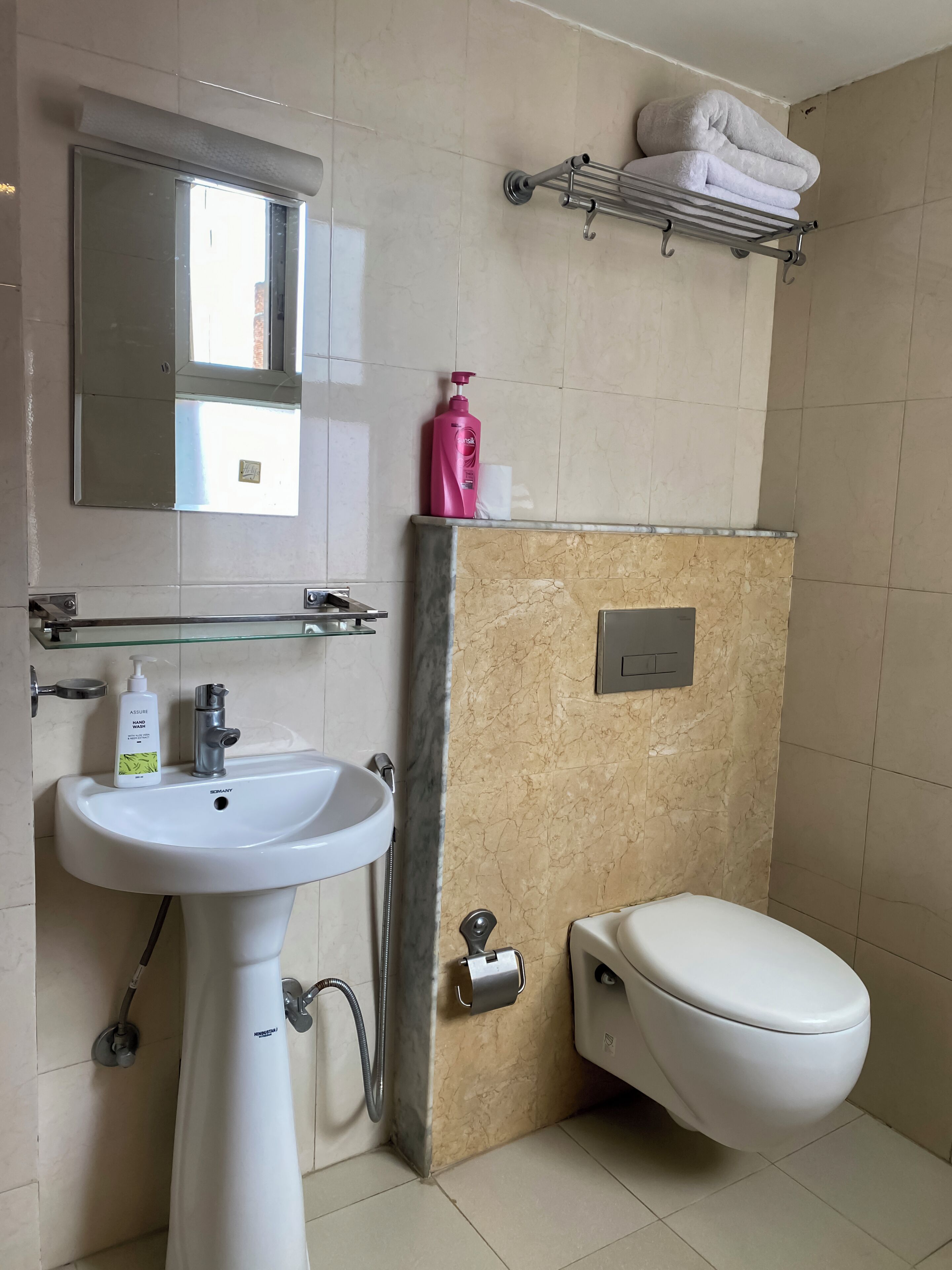 deluxe double room | bathroom | shower, free toiletries, slippers, towels