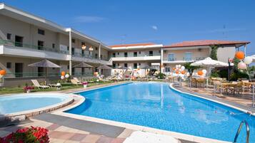 Outdoor pool, pool umbrellas, pool loungers