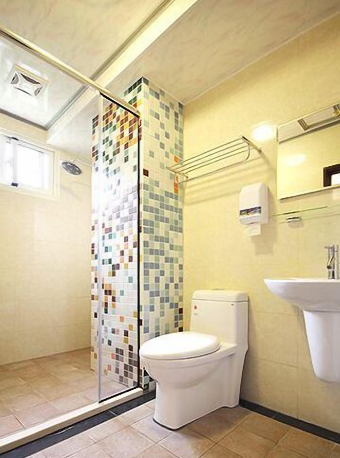 basic quadruple room | bathroom | shower, hair dryer, slippers, towels